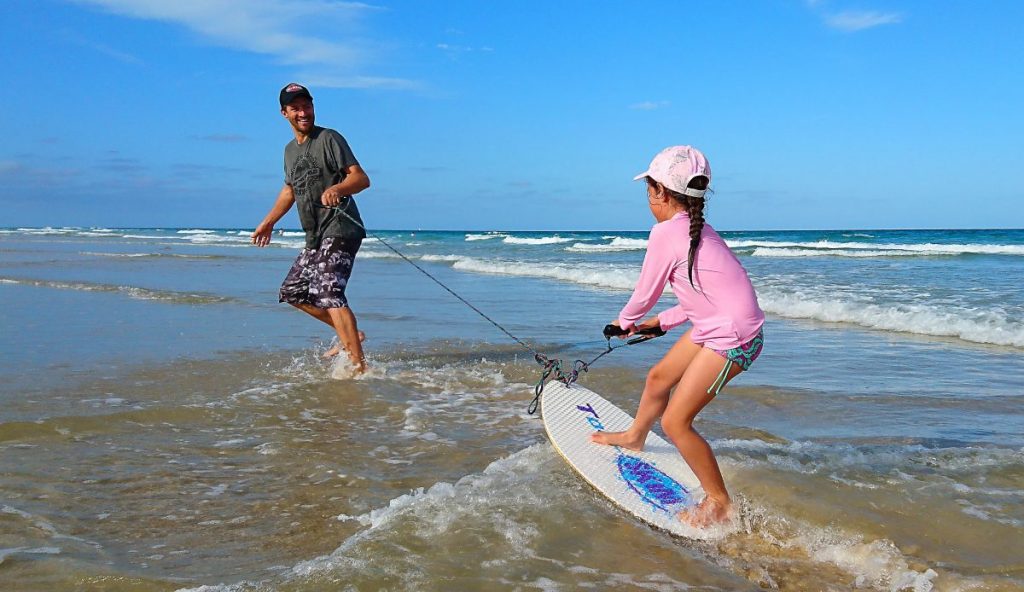 Surfing on a Tow Skim board